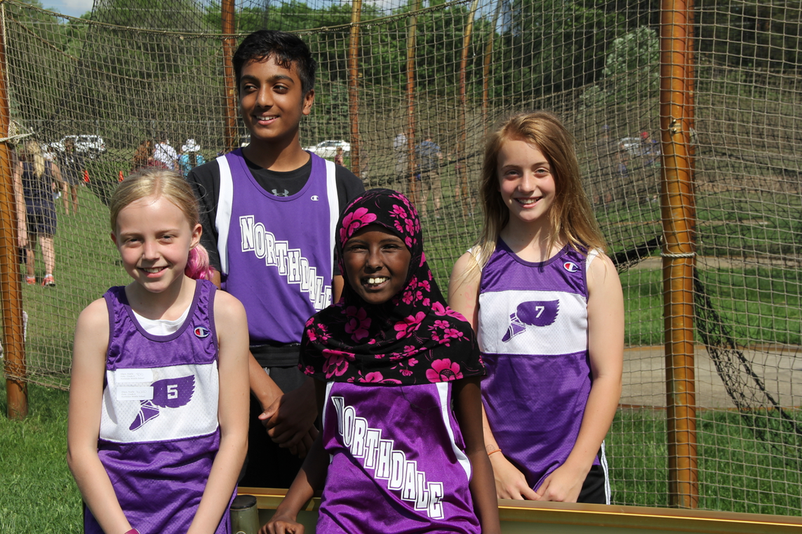 Students smile at track meet 